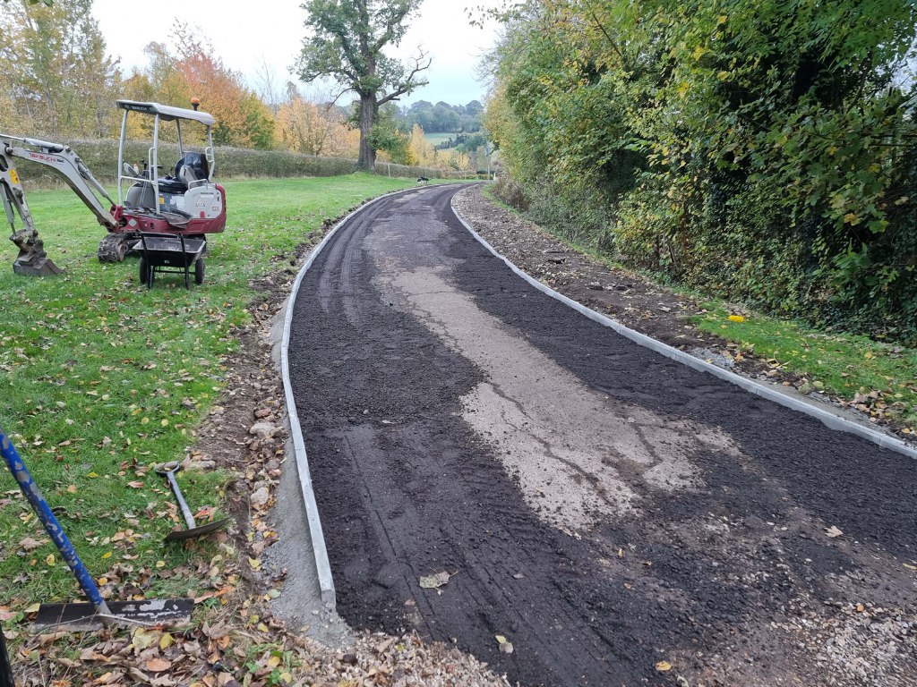 This is a large driveway which is in the process of having a tar and chip driveway installed on by NS Driveways Caterham