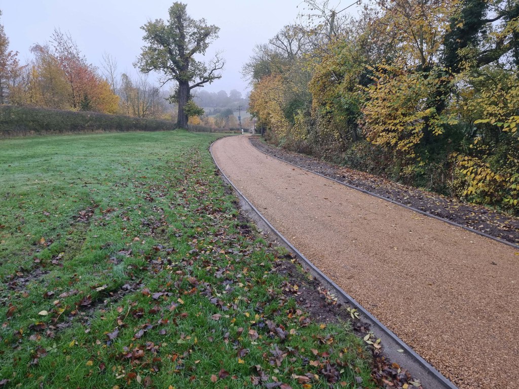 This is a large driveway which has just had a tar and chip driveway installed on by NS Driveways Caterham