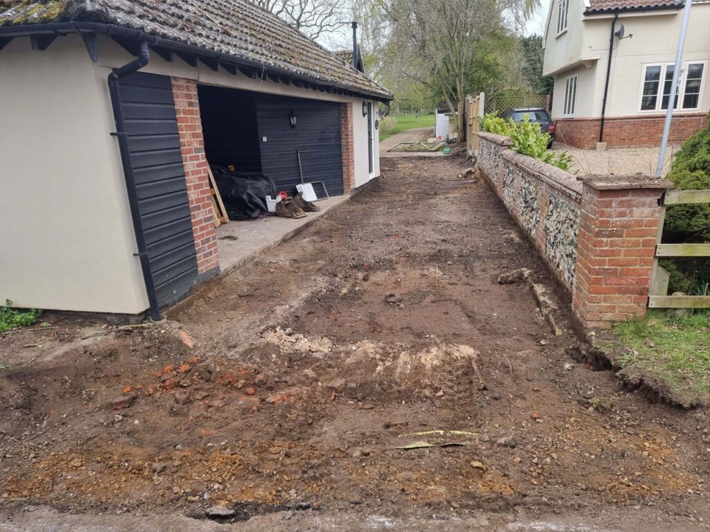 This is a tarmac driveway that is in the process of being dug out and installed by NS Driveways Caterham